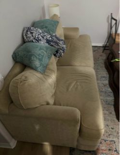 Beige Couch + 2 Throw Pillows