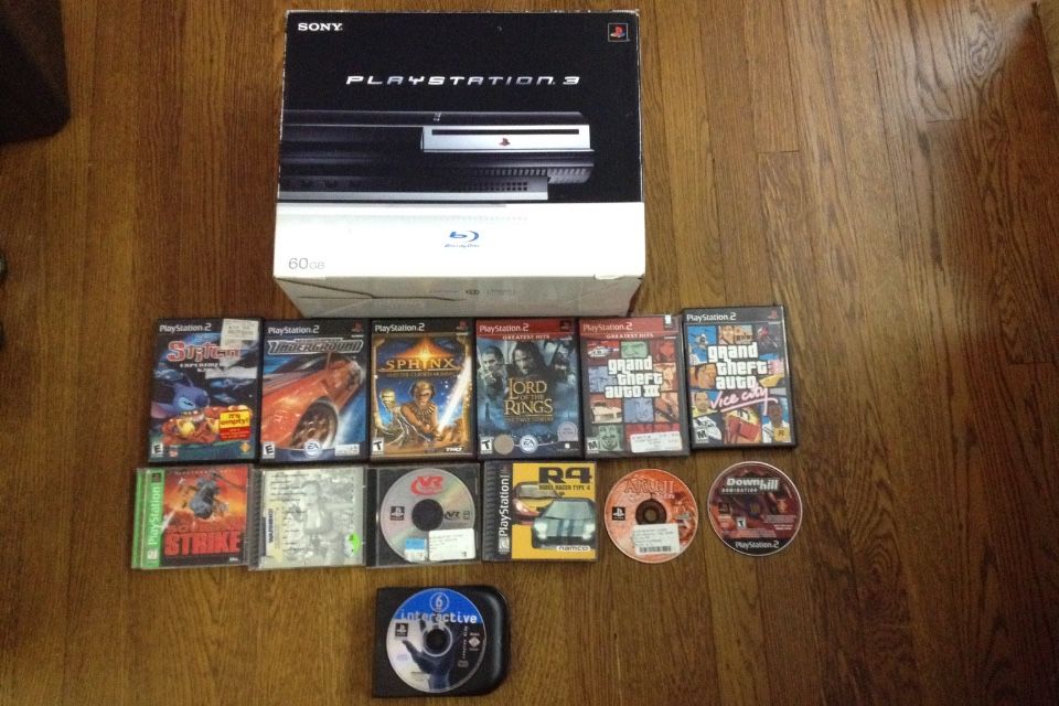 Used PlayStation 3 Backwards Compatible PS3 - Plays PS1 PS2 & PS3 Games - Includes 13 Games