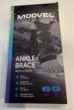 The MODVEL Ankle Brace with Adjustable Straps is designed for stabilization and support of the ankle joint. This black 2-pack brace features adjustabl