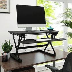 Adjustable computer riser
