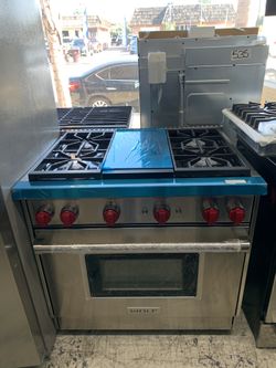 Wolf 36” slide in range with middle grill in stainless steel