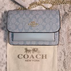 Coach blue purse with gold chain