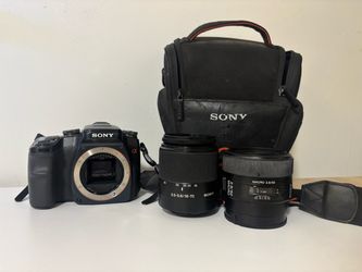 Sony Alpha A100 Camera Bundle - UNTESTED - Includes 2 lenses & bag