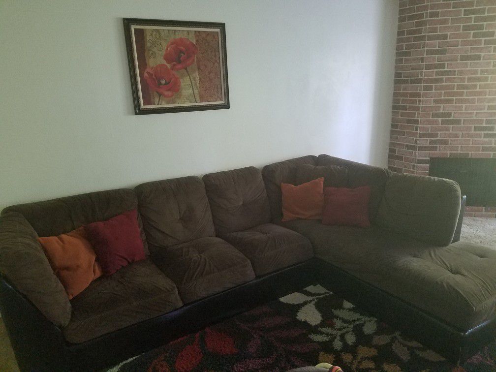 Couch (sectional) with ottaman same color