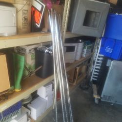 8  metro shelf posts  with triangle balancers 5 ft tall