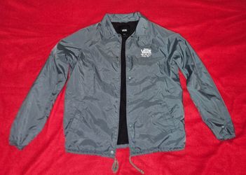 Vans Torrey coach jacket with a snap-button front and a small Vans logo on the chest, small