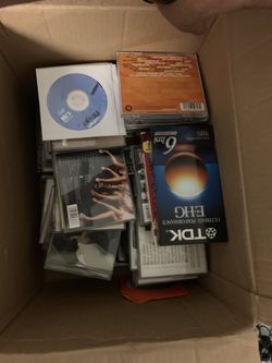 2 boxes of cd and movies