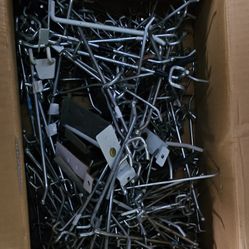 Have lots of peg hooks and Slatwall , Over 100 Pieces