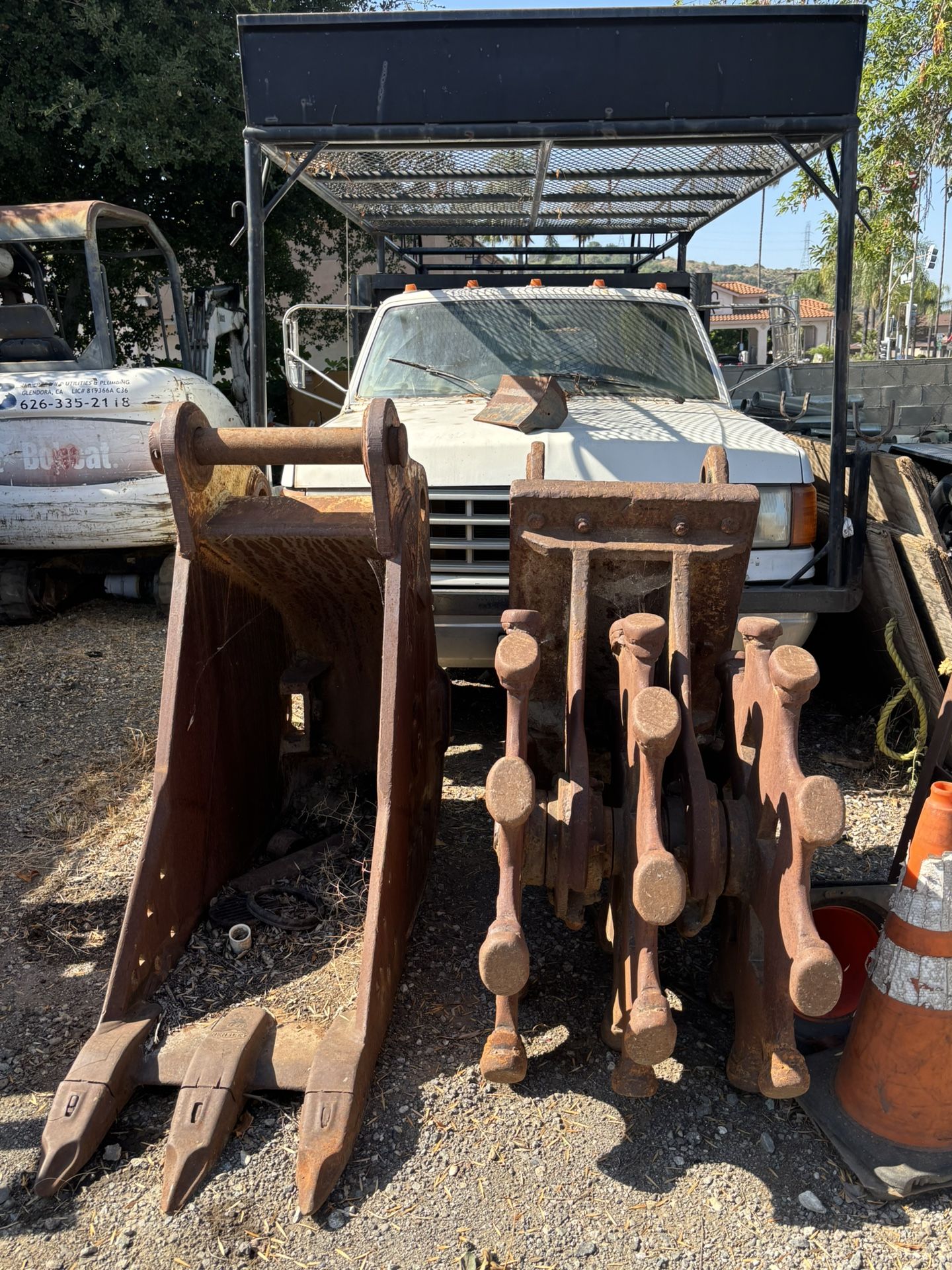 Excavator Bucket And Compaction Wheel