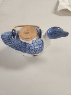 Porcelain and bamboo duck teapot