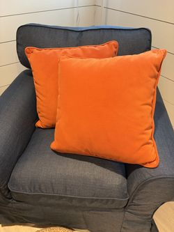 A pair of new pillows, made by an upholsterer.