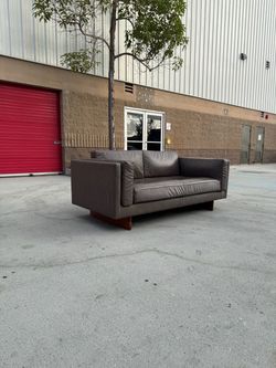 MCM faux leather sofa- delivery available