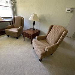 Two matching wingback chairs