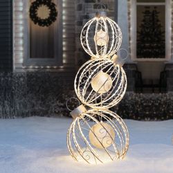 New in box Member's Mark 62" Pre-Lit Rotating Ornament Décor - Warm White