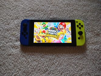 NINTENDO SWITCH V2 with 7500 GAMES