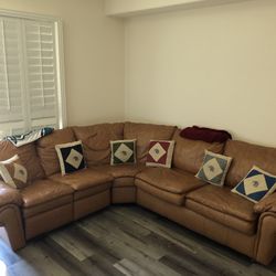 Leather sectional With Pull Out Bed