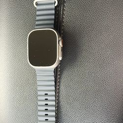 Apple Watch Ultra (GPS + Cellular). 49mm. + Charger.