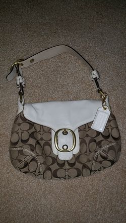 Womens brown and white coach purse