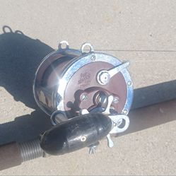 Sabre Stoker With A Penn 114-H Reel Fishing Rod
