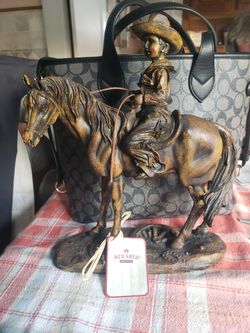 Boy On Horse Statue