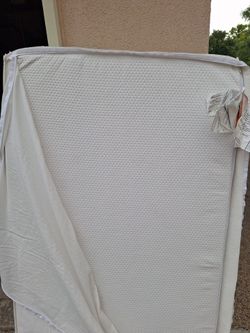 Crib mattress with waterproof cover