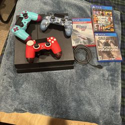 Ps4 With Games Controllers And Steering Wheel 