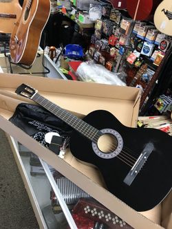 38” acoustic guitar black new with bag, strings, strap, pick and pitch pipe