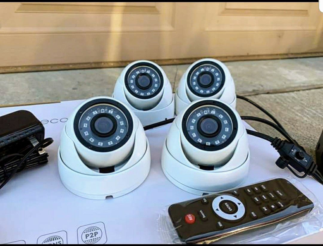 4 1080p security cameras with instalation.. Hablo Espanol