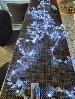 Bundle of 4 beautiful LED string lights with a silver leaf design