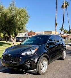 2017 Black Cherry Kia Sportage AWD