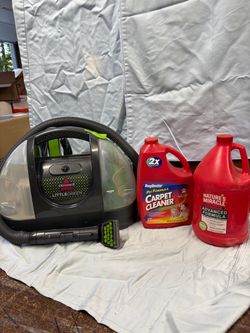 Little green machine by BISSELL w/cleaner solution