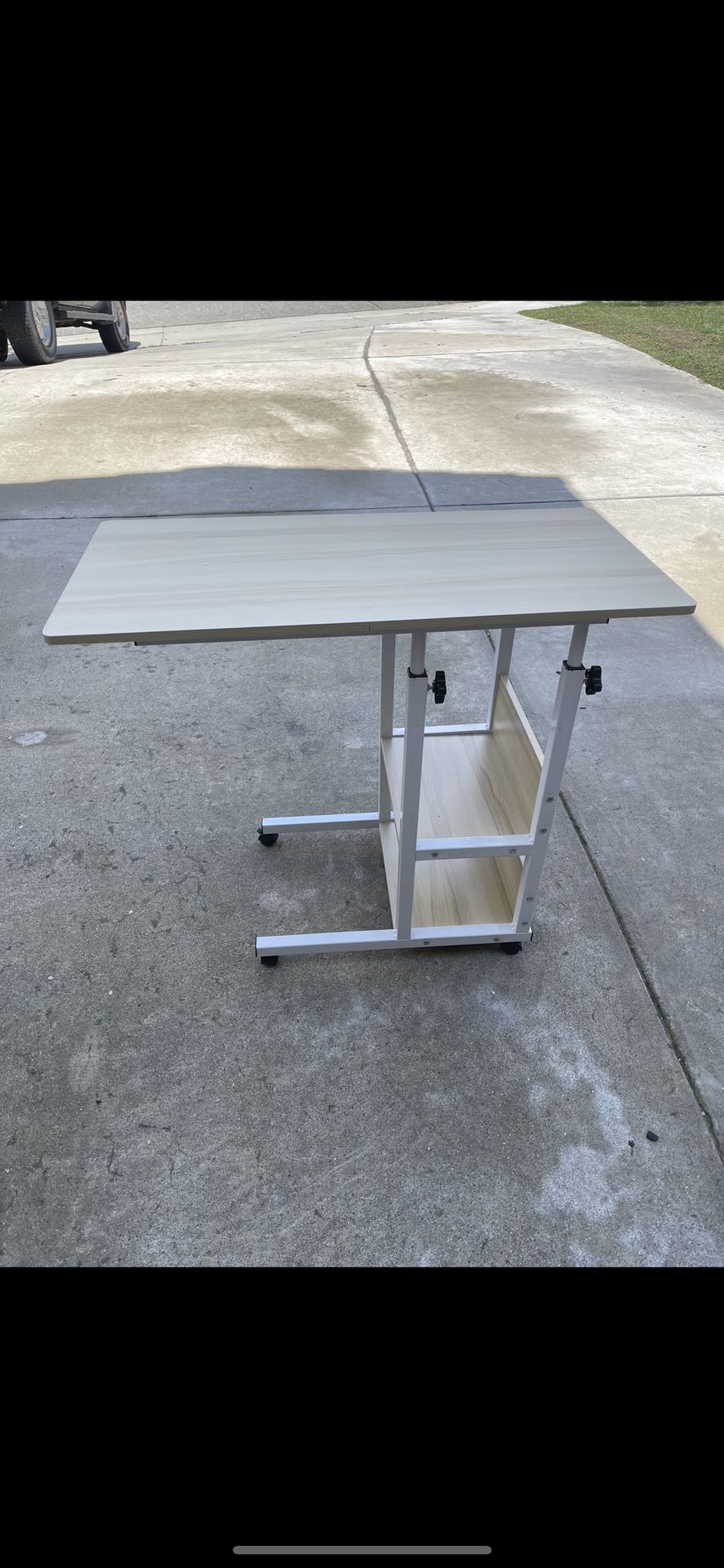 Small Desk With Wheels $35