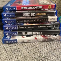 Used PS4 Slim 1TB + 17 games + 2 Controllers