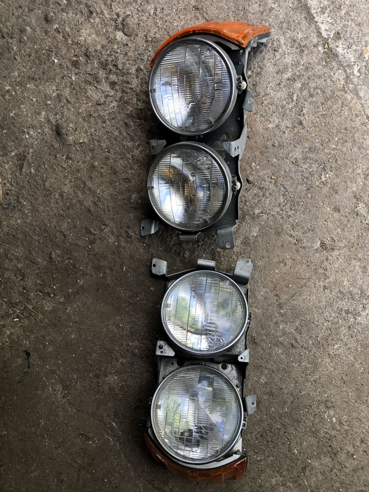 Mid 80s Mercedes Benz headlight with parking light complete assembly