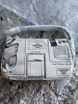 Coach Newspsper bag/ wristlette