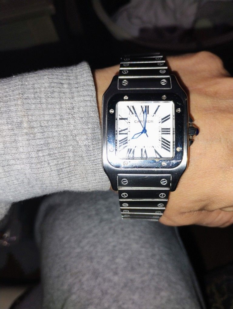 C HING CO
Cartier Santos Watch