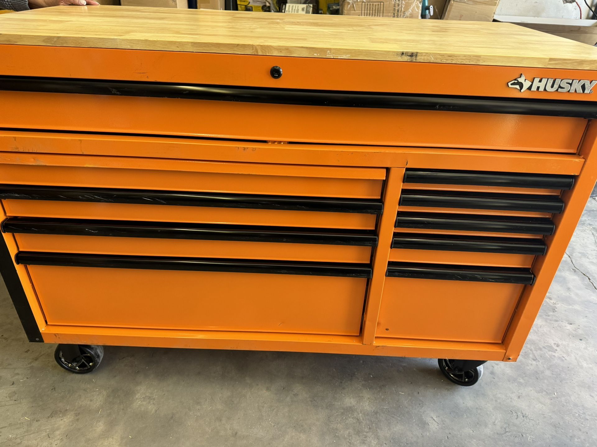 Husky 52 in. W x 24.5 in. D Standard Duty 10-Drawer Mobile Workbench Tool Chest with Solid Wood Work Top in Gloss Orange $450 New.