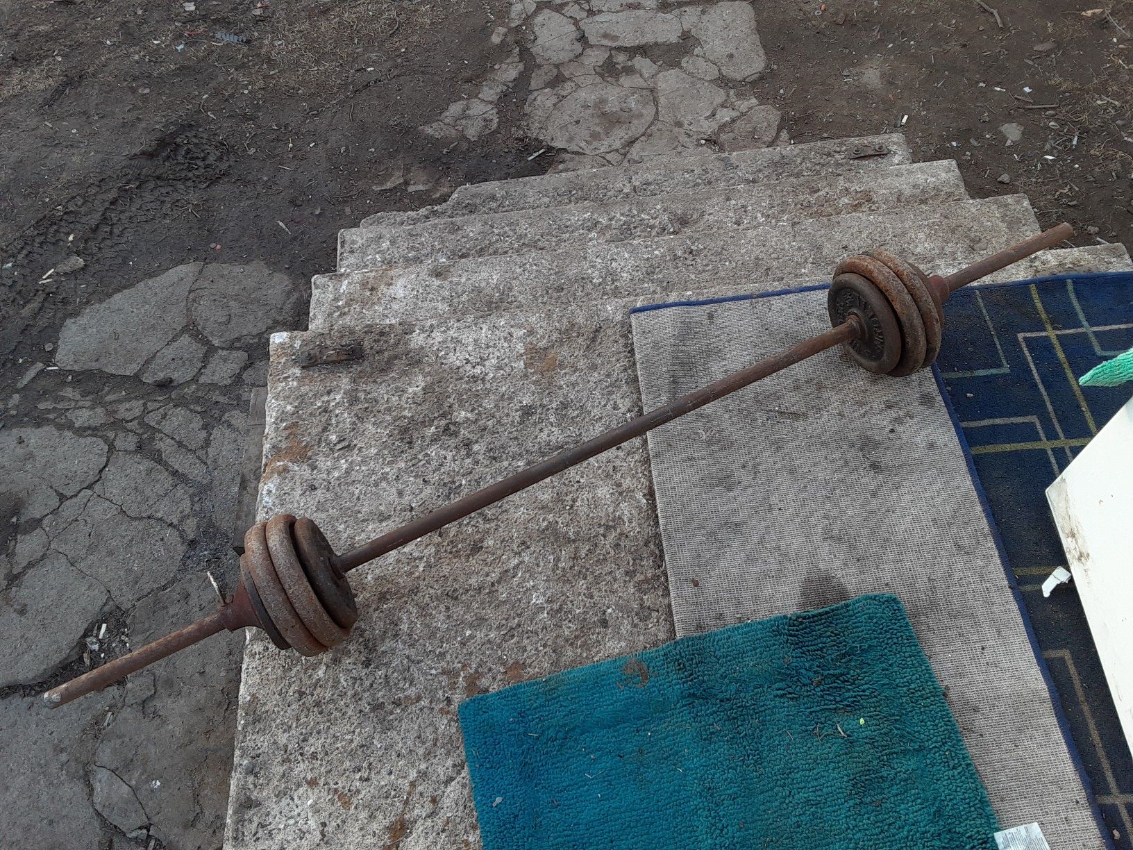 Hurry hurry for the low rusty but trusty free weights weight bar with 80 pounds of weight
