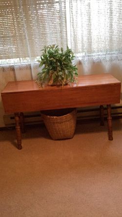 Solid maple wood  drop leaf table.