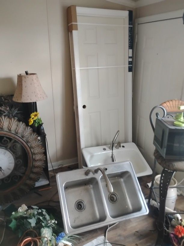 Door, Sinks And Antique Leather Top Tables