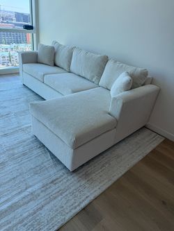 Brand new cream sectionals in stock