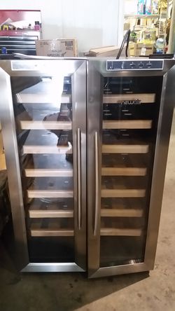 Brand new wine cooler with wood racks