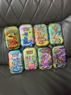 Pokemon Prismatic Evolution Tins