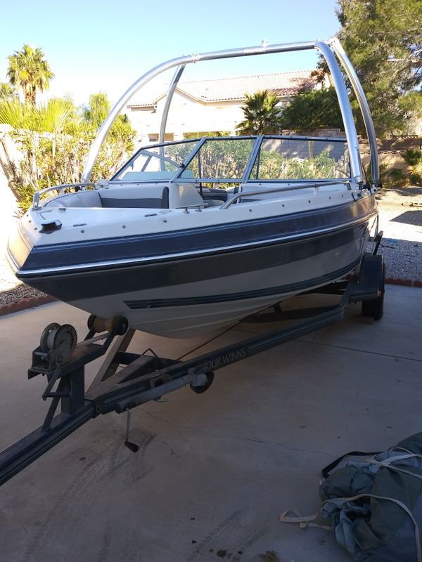 1990 4 winns boat& trailer with extras!