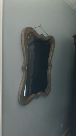 Distressed wall mirror