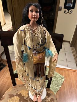 35” tall ceramic doll with stand. $50 or best offerings