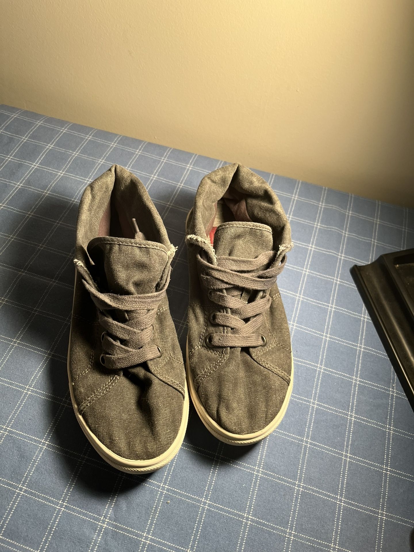 Grey canvas shoes in good condition. Size 7