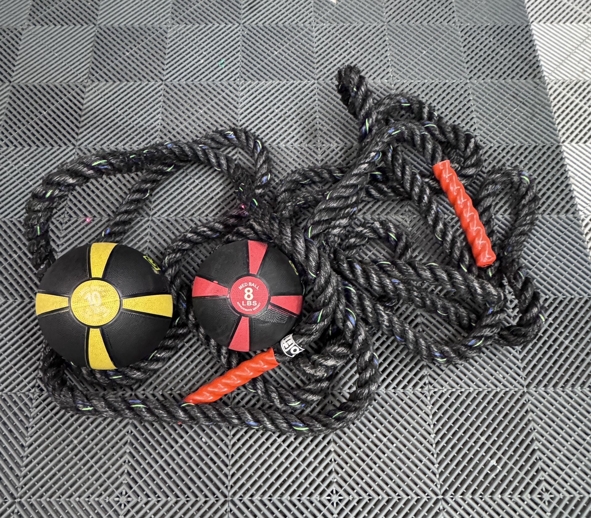 GoFit combat rope and weighted balls