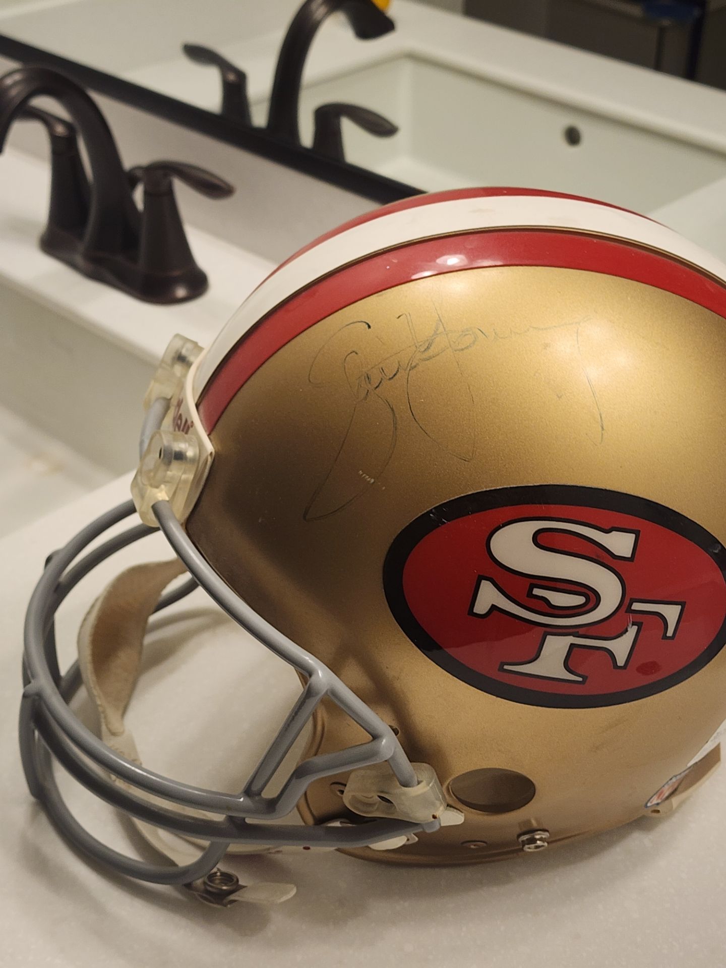 Authentic San Francisco 49'ers Helmet warn by Quarterback Steve Young signed.