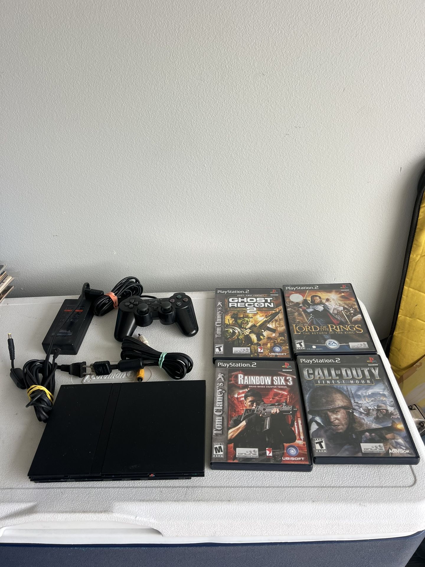 PS2 Slim And 4 video games